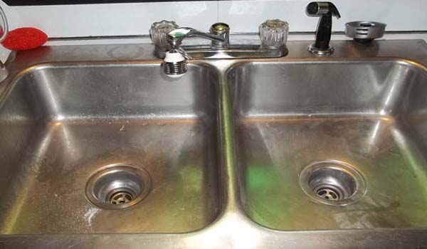 How To Unclog A Double Kitchen Sink With Standing Water?